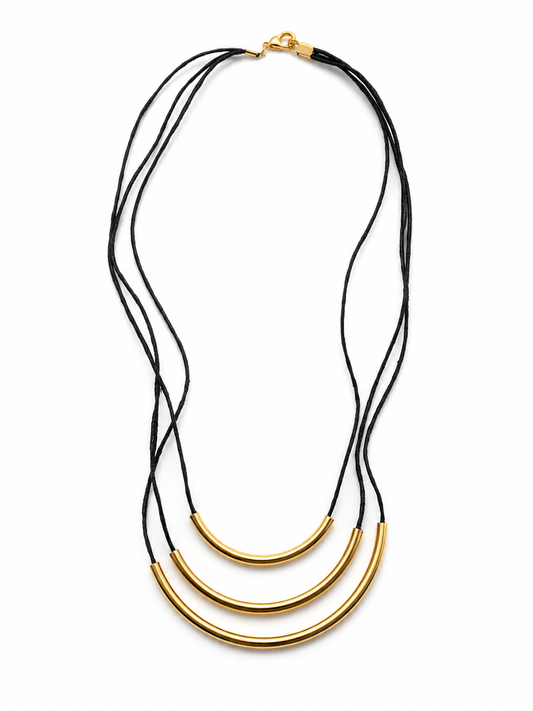 Simple black cord and gold coloured necklace